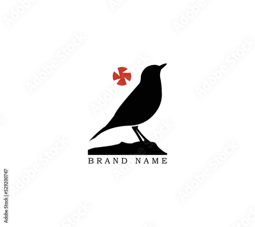 Bird negative space logo on branch with moon and stars background