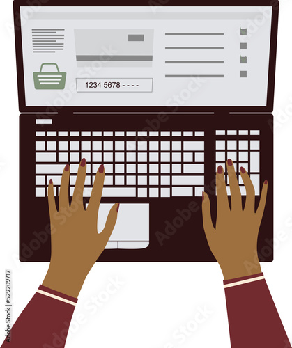 Online shopping Hands and laptop. Human enters bank card details to pay for purchases.