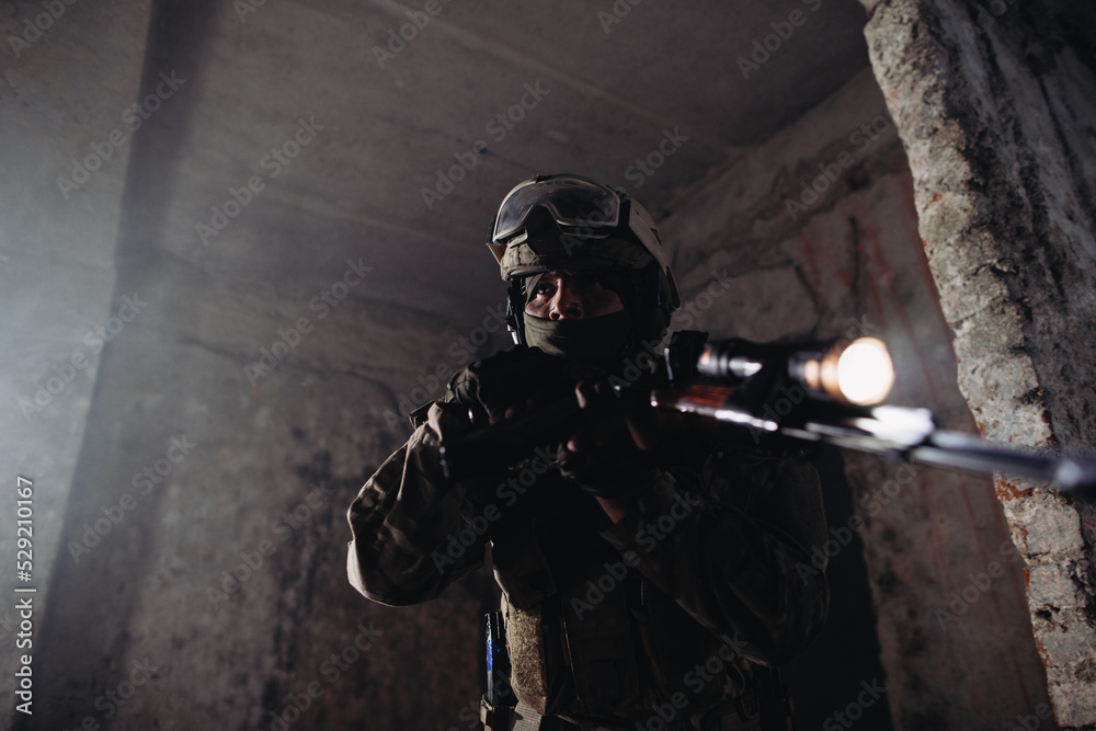 Fototapeta premium Ukrainian soldiers on the battlefield. Special forces conduct reconnaissance on enemy territory.