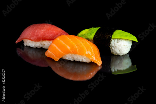 mackerel, salmon and avocado sushi photo