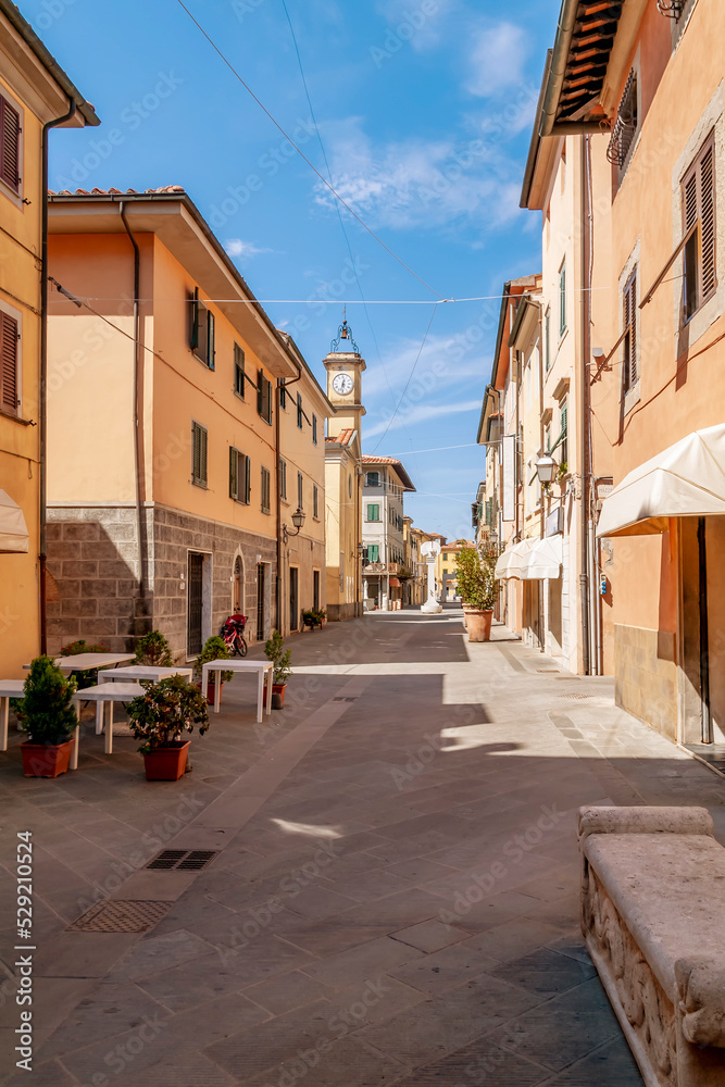 The main street in the old town of Ponsacco, Pisa, Italy, without people on a sunny day