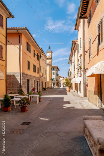 The main street in the old town of Ponsacco  Pisa  Italy  without people on a sunny day