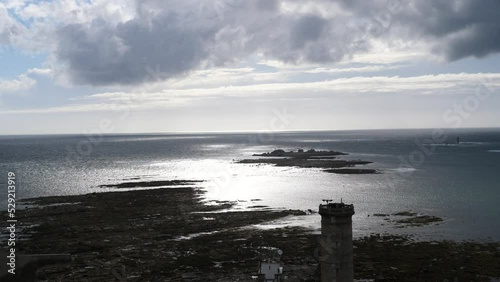 A view from the top of the Eckmül lighthouse on the Atlantic and the rocky coast. photo