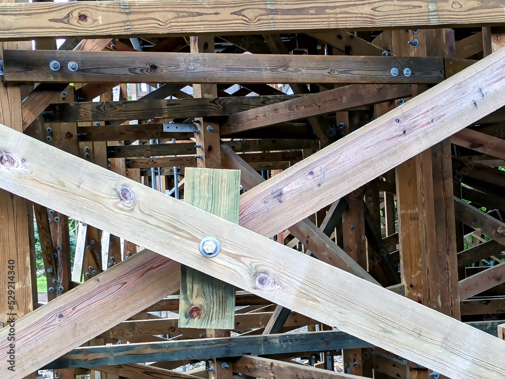close up of Wood beam framework bolted together close up of Wood beam framework bolted together