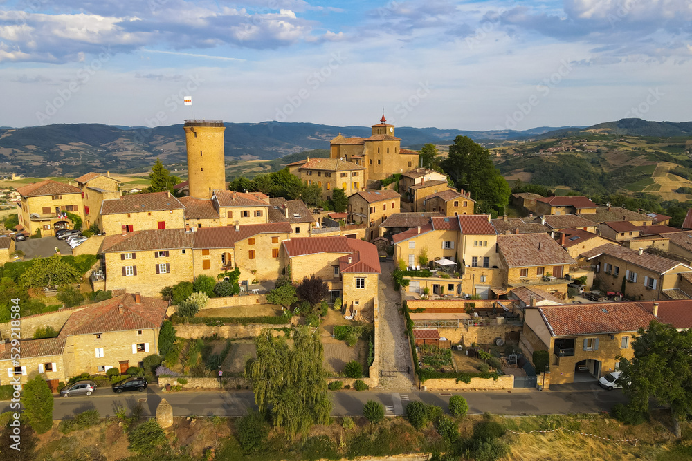 Obraz premium Aerial sunrise view above the village of Oignt in Beaujolais France