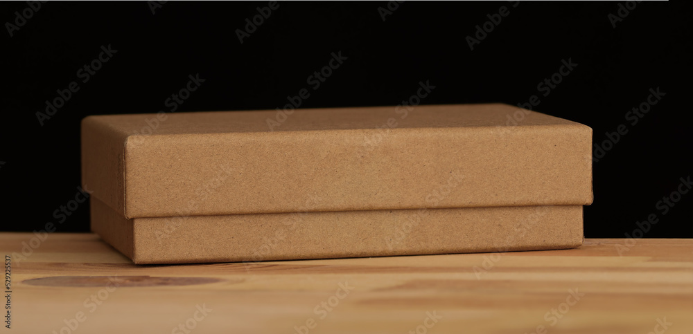 Сlosed craft box on wooden table