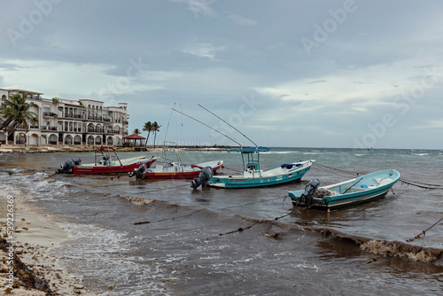 Boats on the water, stormy sea in Playa del Carmen, Mexico