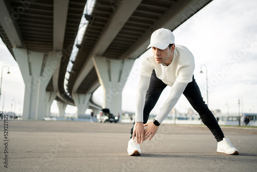 Male Athlete active training in the city.