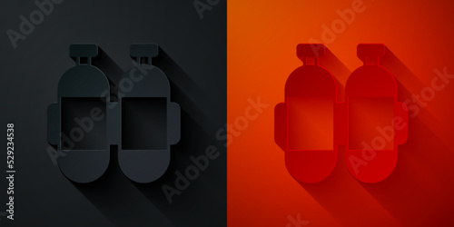 Paper cut Aqualung icon isolated on black and red background. Oxygen tank for diver. Diving equipment. Extreme sport. Diving underwater equipment. Paper art style. Vector