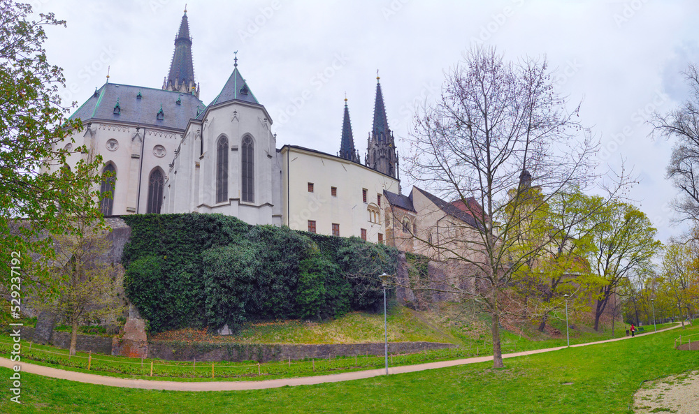 2022-04-20 panoramic view of park under Saint Wenceslas Cathedral with Olomouc castle wall. Olomouc, Czech Republic.