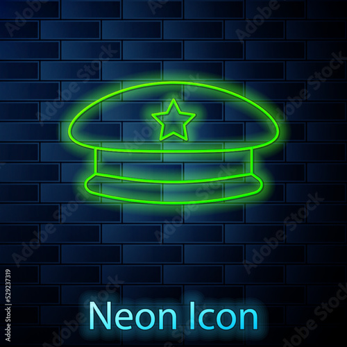 Glowing neon line Military beret icon isolated on brick wall background. Soldiers cap. Army hat. War baret. Vector