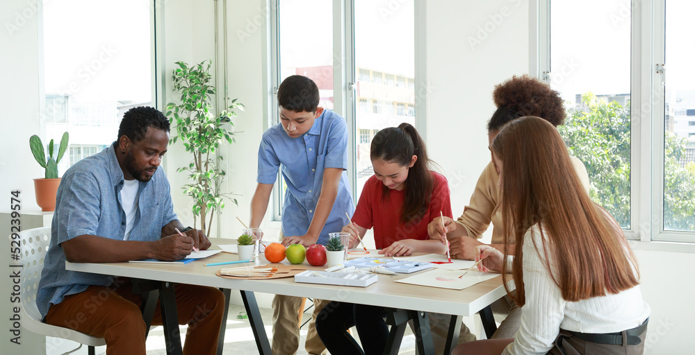 Obraz premium male and female students and African teachers Doing drawing and painting activities