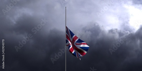 UK flag in half mast. United Kingdom flag against dark dramatic cloudy sky. 3D render British flag illustration photo