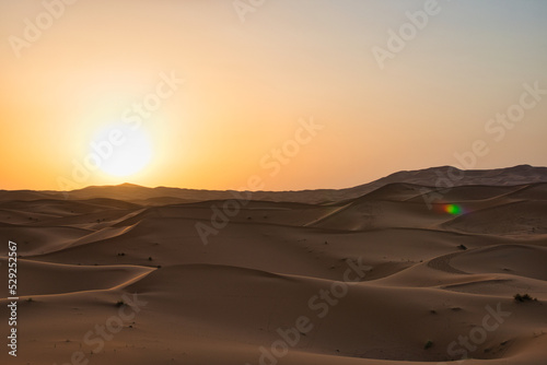 Dunes in the Sahara desert at sunrise  the desert near the town of Merzouga  a beautiful African landscape