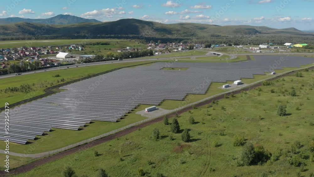Aerial view to ecology solar power station panels in Altai Republic, Russia. Aerial view to ecology solar power station panels in Altai Republic, Russia.