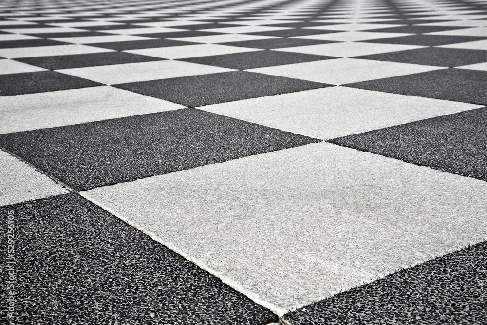 Detail of the pavement of the famous Mascagni square in Livorno with the particular chessboard design (Tuscan-Italy)