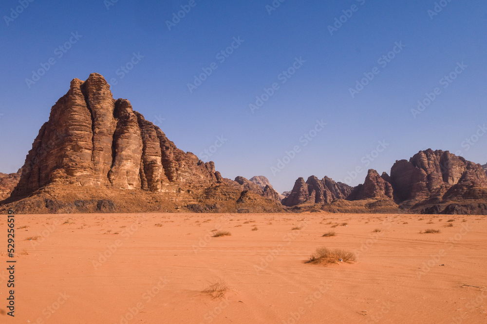 Wadi Rum Desert landscape in Jordan. Dunes and mountains. Travel and tourism concept.