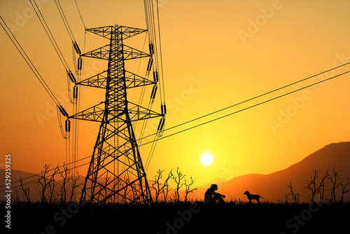 The idea of ​​scarcity of electricity. Desperate men have no money to pay for electricity. with high voltage transmission towers