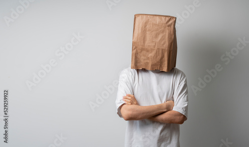 person with blank paper bag on head, mockup template photo