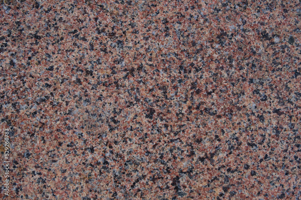 Texture and background red granite rock volcanic origin. Texture and background red granite rock volcanic origin.