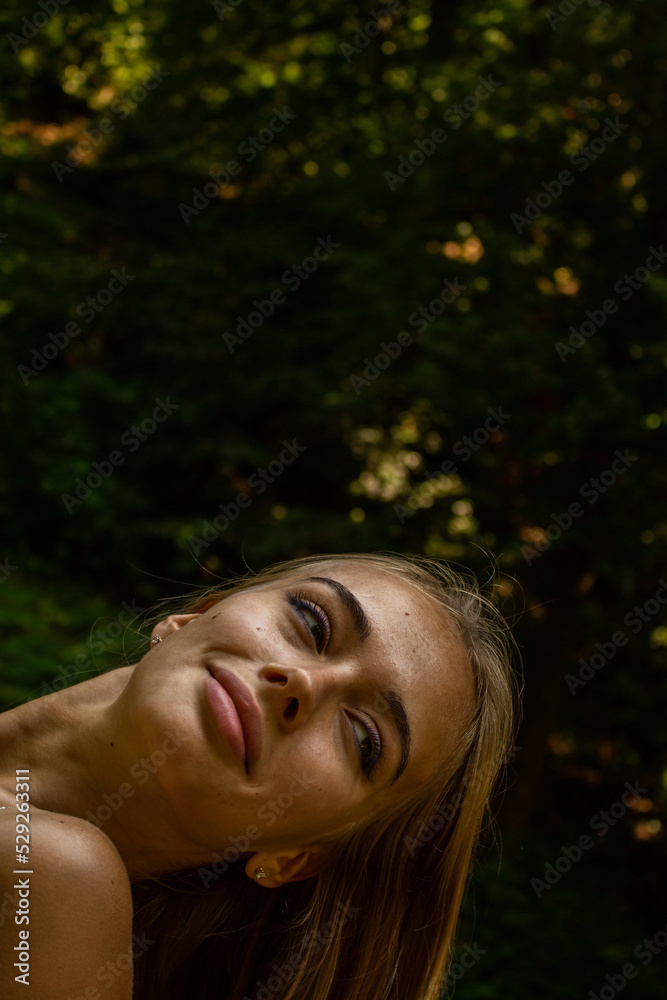 Beautiful blonde girl in a white top and blue skirt Beautiful blonde girl in a white top and blue skirt