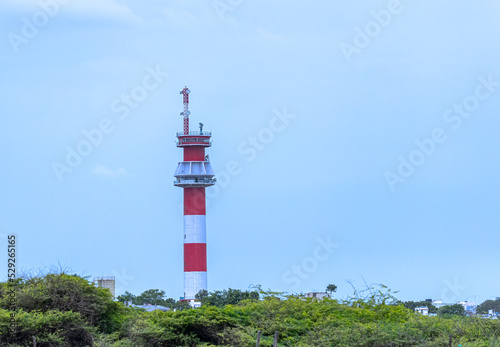 A Lighthouse near a sea beach