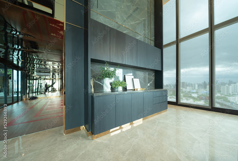 Empty room of luxury modern kitchen area and cabinet decoration on condominium lounge, interior design. Empty room of luxury modern kitchen area and cabinet decoration on condominium lounge, interior design.