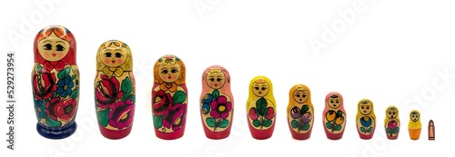 Traditional Russian national dolls (Matryoshka) and the bullet of the army white background. Matryoshka consists of bullets