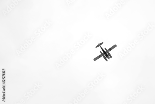Low angle view of seaplane flying in clear sky photo