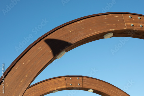 Wooden arch. Construction against sky. © Олег Копьёв