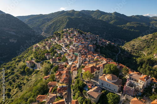 Aerial view of the historical village Dimitsana with the traditional houses and the famous clock tower in Arcadia, Peloponnese, Greece
