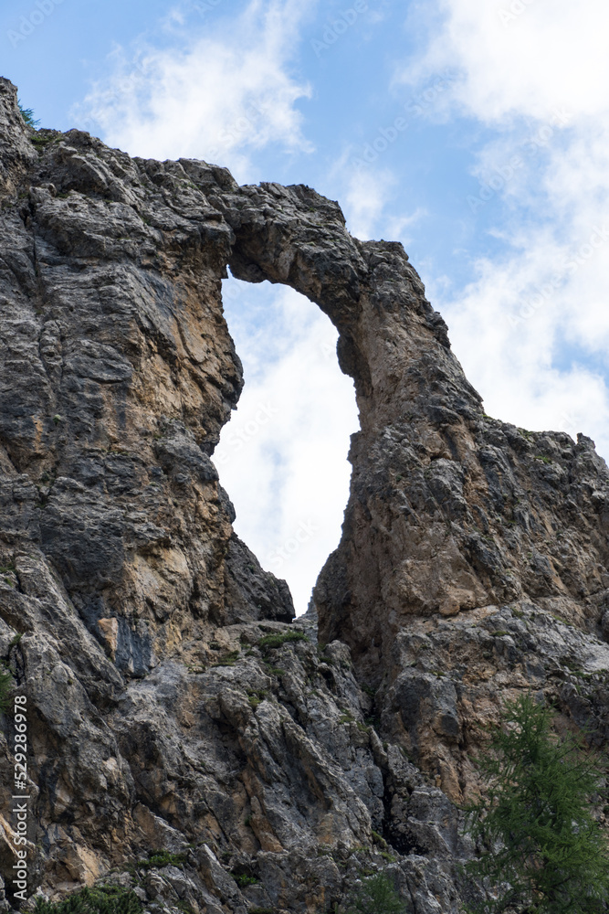 arch in the rock, Forcella Franzei Route, Dolomites Alps, Italy 