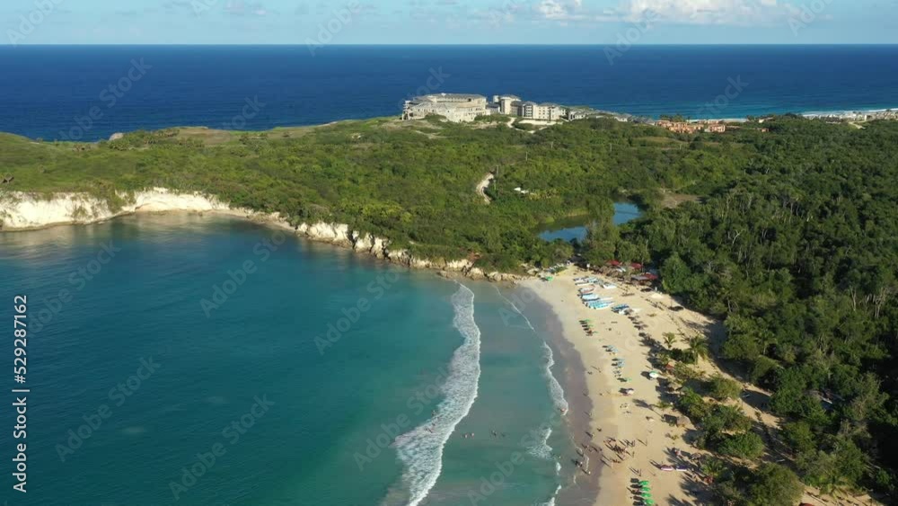 Macao beach with turquoise water and stone cliff. Dominican Republic. Aerial drone view Macao beach with turquoise water and stone cliff. Dominican Republic. Aerial drone view