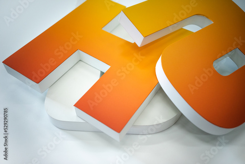 Production of letters in outdoor advertising. Three-dimensional large letters for signage. Production of interior advertising made of plastic. Plastic symbols for advertising. photo