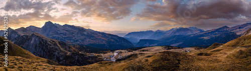 Evening dusk autumn Dolomites panoramic Rolle Pass view, Trento, Italy.