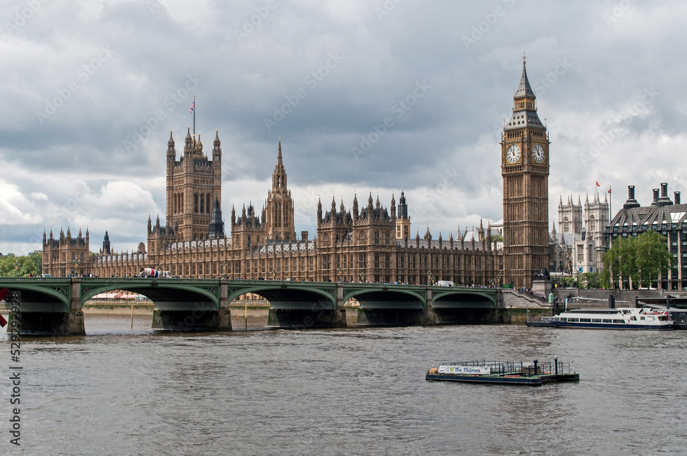 The British Parliament, and the Big Bens clock at the Thames River in Westminster