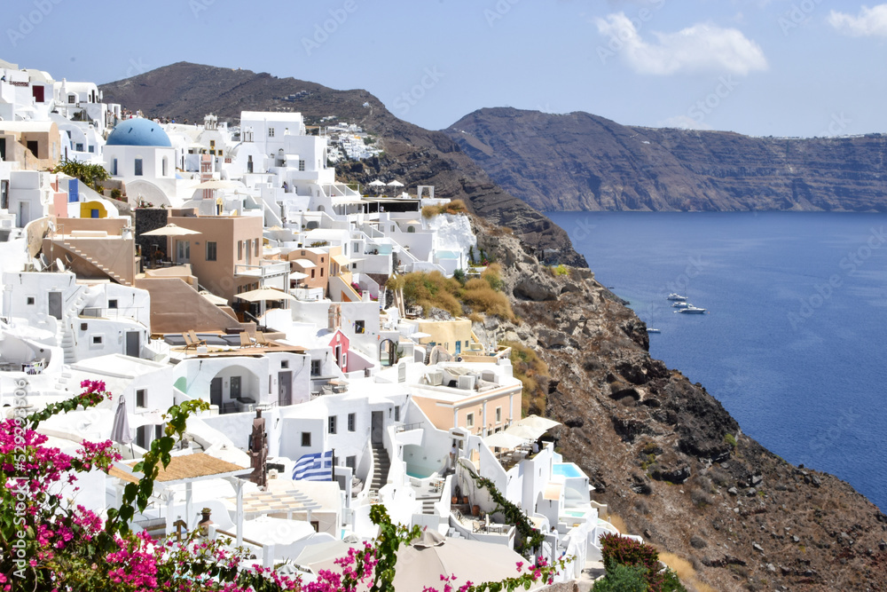 Scenic view of the authentic white houses in the Santorini villages Oia and Thira, on Santorini island, Greece