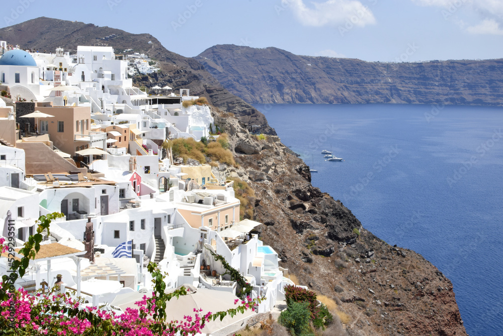 Scenic view of the authentic white houses in the Santorini villages Oia and Thira, on Santorini island, Greece