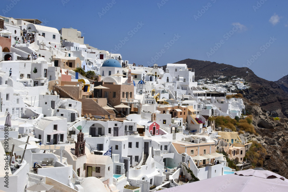 Scenic view of the authentic white houses in the Santorini villages Oia and Thira, on Santorini island, Greece