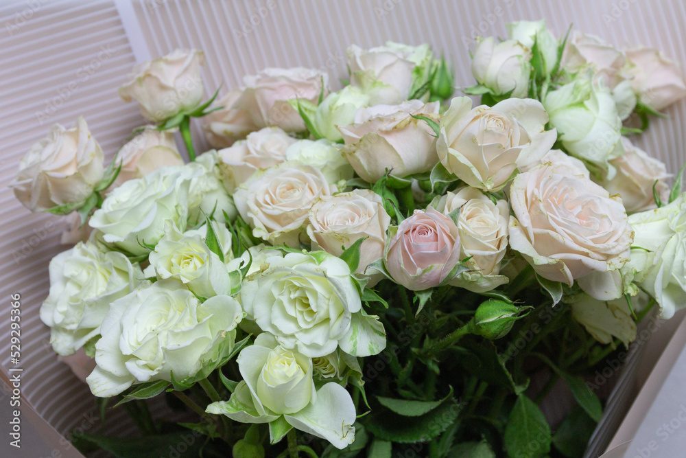Obraz premium Beautiful bouquet of flowers. Modern flower arrangement with roses. On a white background Picture for a screensaver.