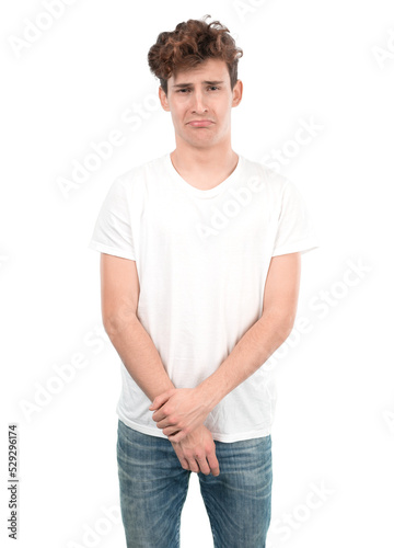 Sad young guy posing