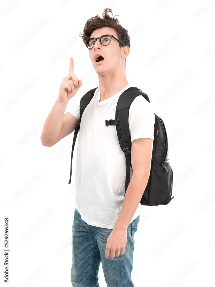 Shocked young student pointing up with his hand Shocked young student pointing up with his hand