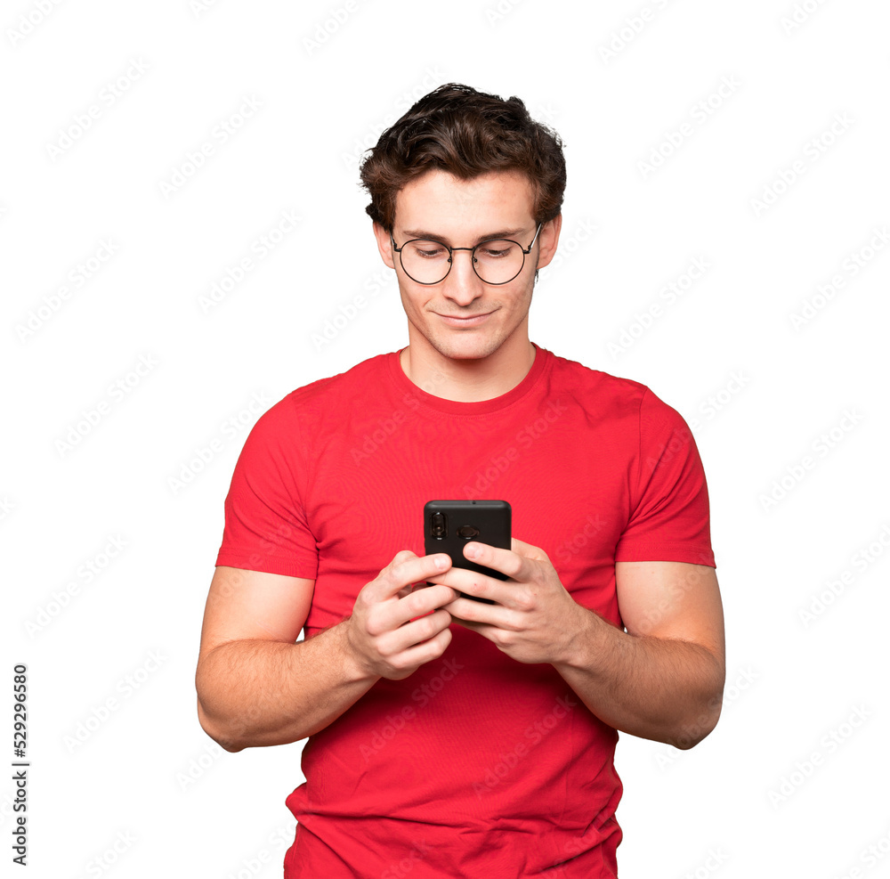 Happy young man using his mobile phone Happy young man using his mobile phone