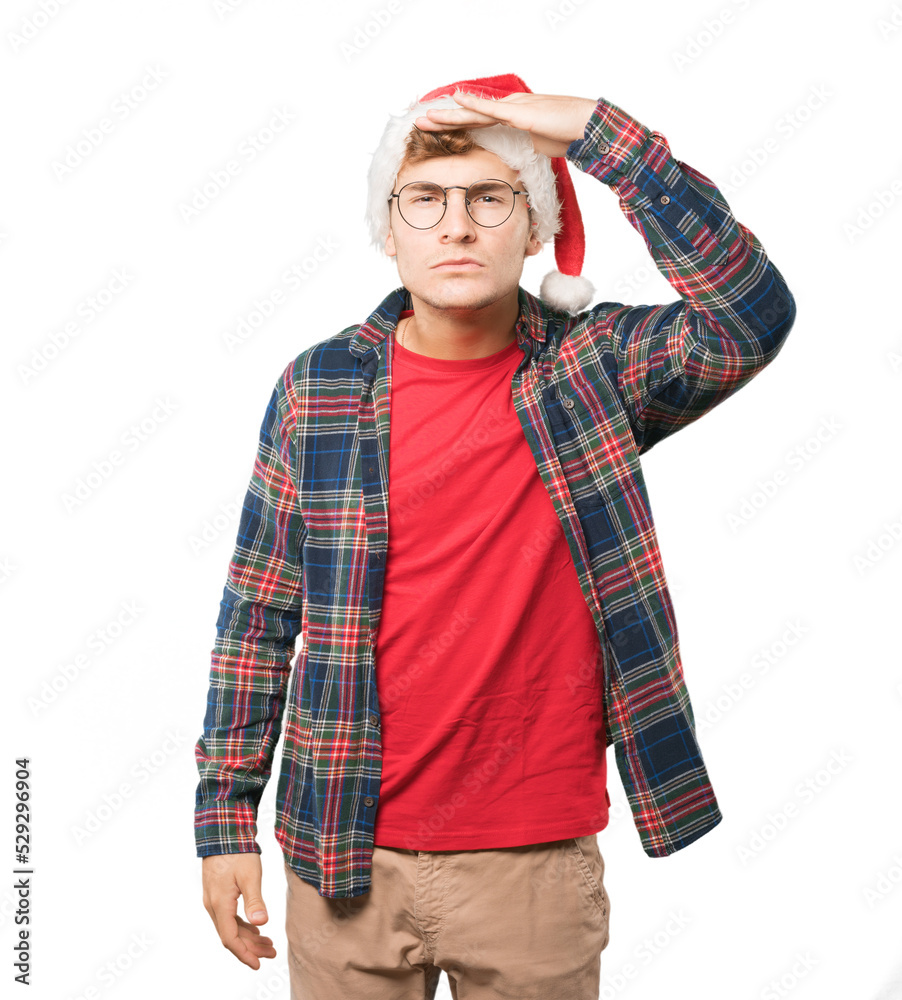 Young man at Christmas doing gestures Young man at Christmas doing gestures