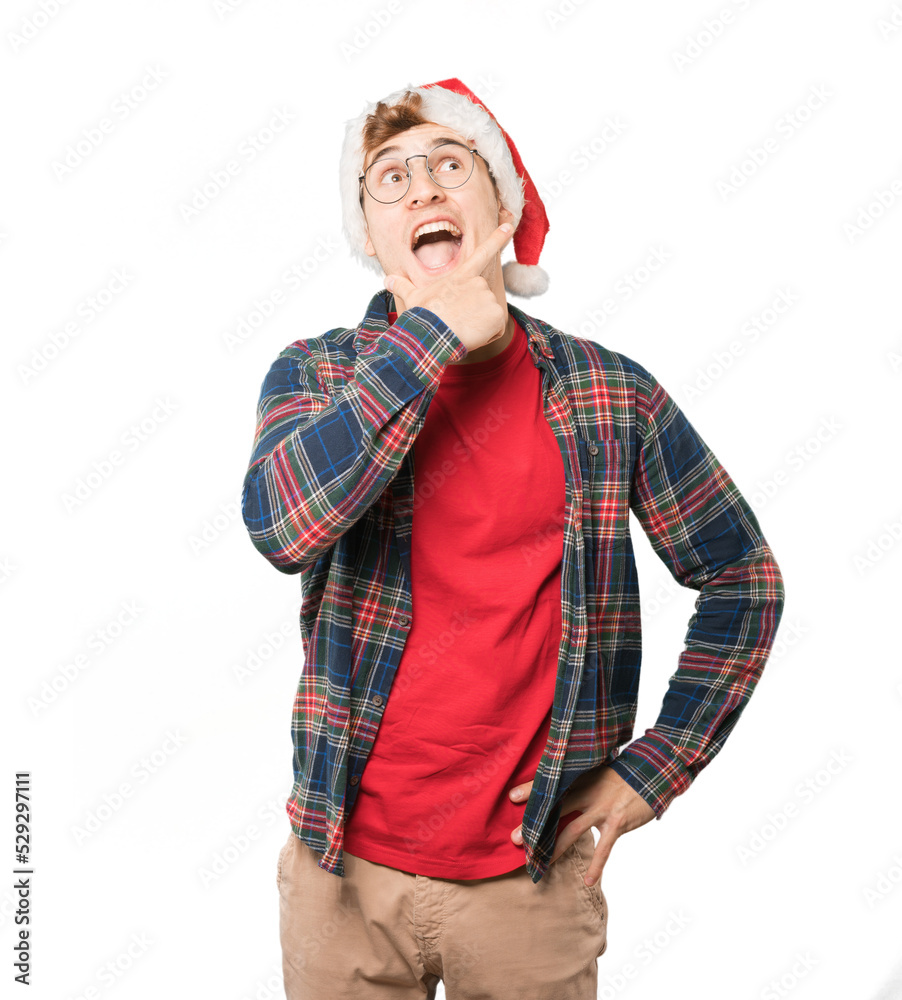 Young man at Christmas doing gestures Young man at Christmas doing gestures