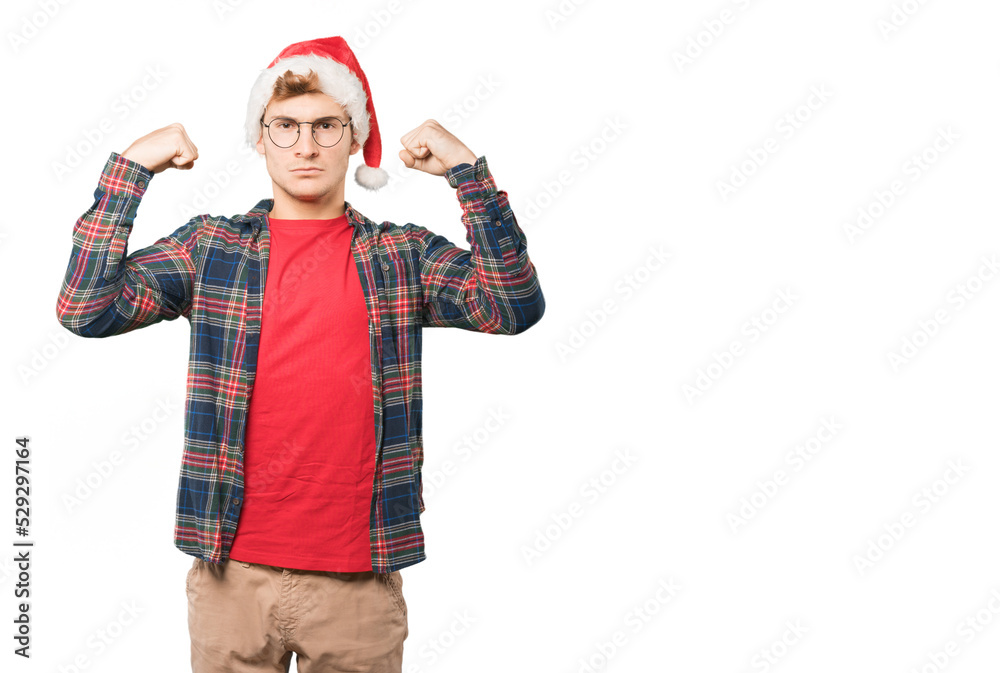 Young man at Christmas doing gestures Young man at Christmas doing gestures
