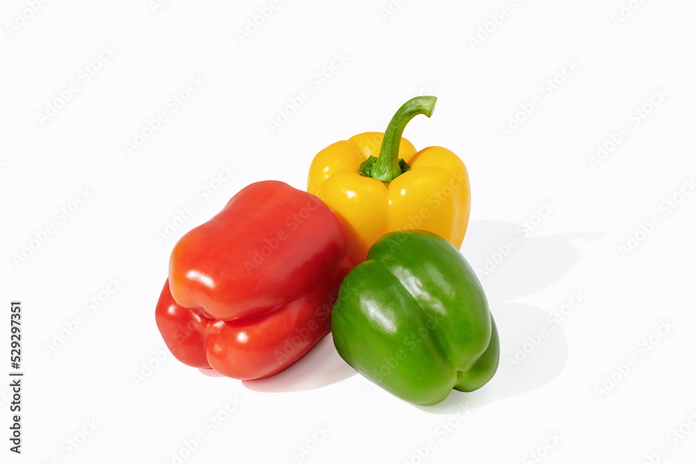 Yellow, red, green pepper on white background Yellow, red, green pepper on white background