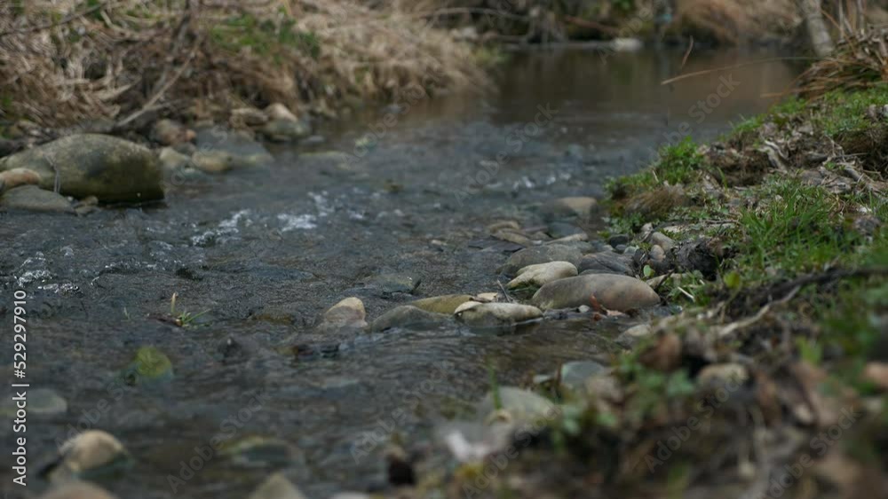 Small River Stone Stream. Spring Season Sunny Day. Rural Scene Background. Beautiful Nature Country. 2x Slow motion 60fps 4K Small River Stone Stream. Spring Season Sunny Day. Rural Scene Background. Beautiful Nature Country. 2x Slow motion 60fps 4K