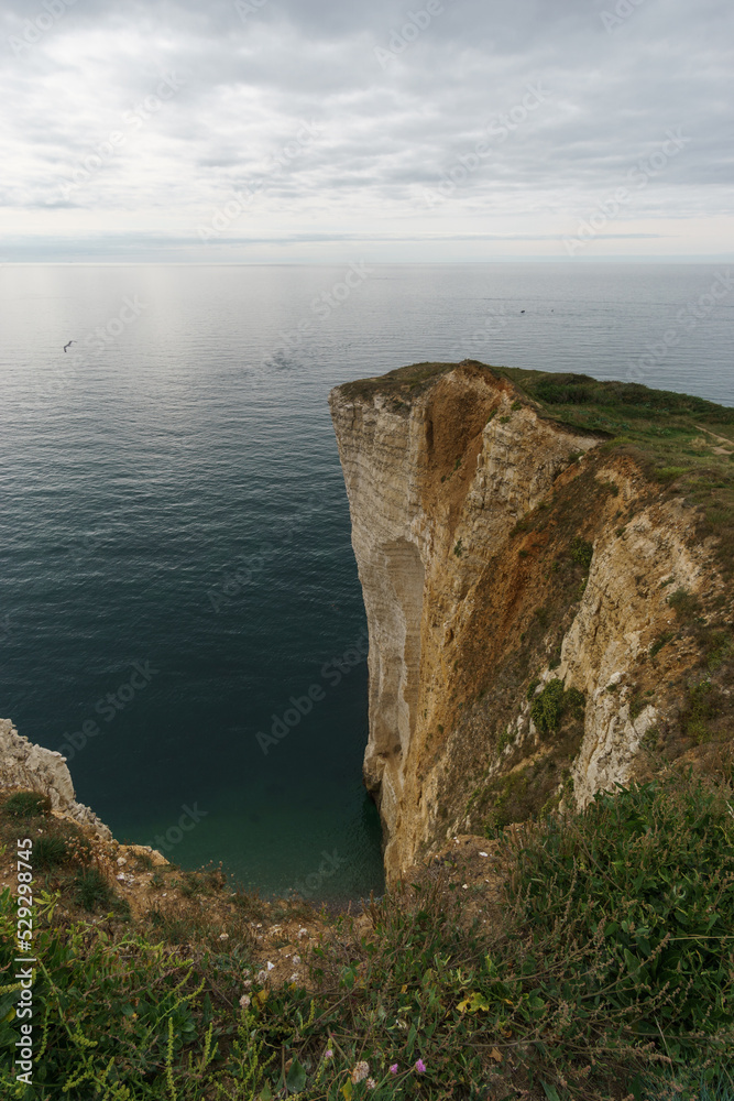 View at Pointe de la Courtine at the Alabaster coast with on a cloudy summer day, Etretat, Normandy, France