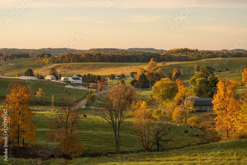 The rolling farmland countryside of Amish country, Ohio in the golden evening sunlight